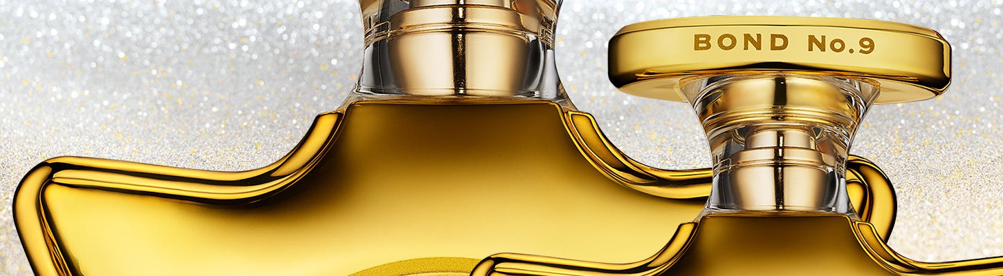 Gold Bond No. 9 perfume bottle on a glittery background