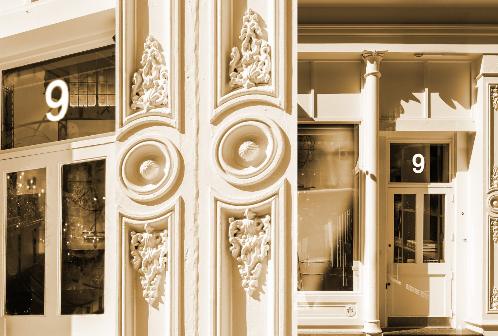 Decorative architectural details of a building facade with number '9' displayed.