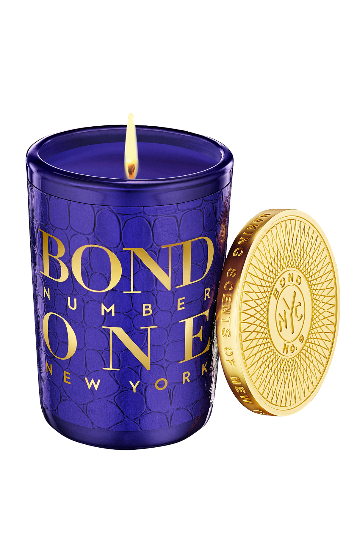 Bond Number One candle with a gold lid on a white background