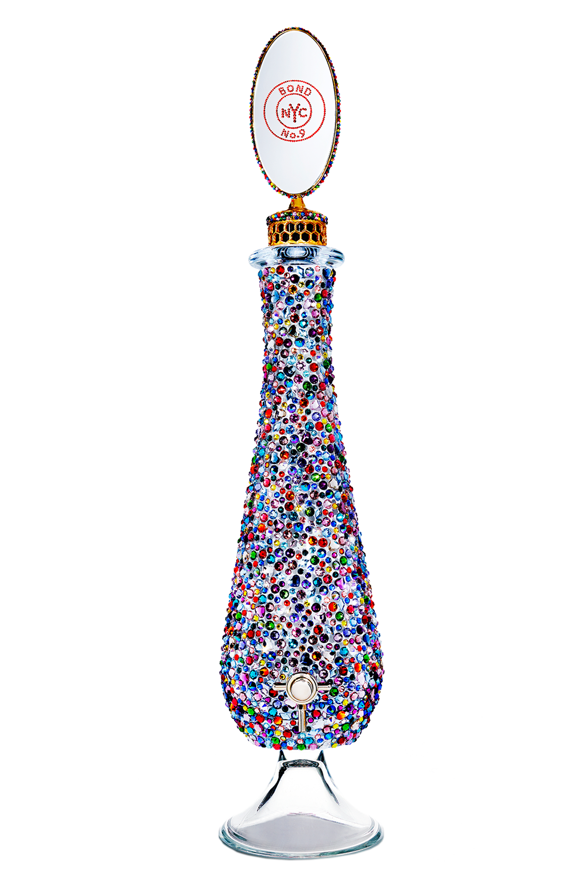 Decorative bottle with multicolored speckles and a white label on a white background