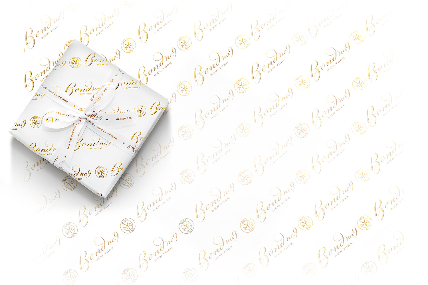 Folded white paper with gold text on a white background
