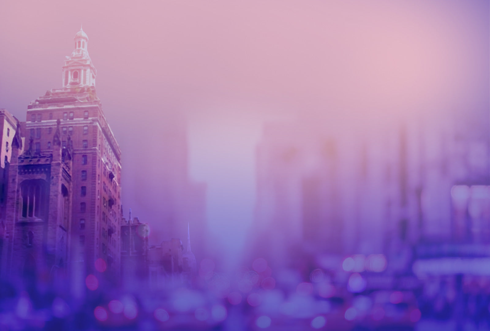 Foggy cityscape with a tall building in the foreground