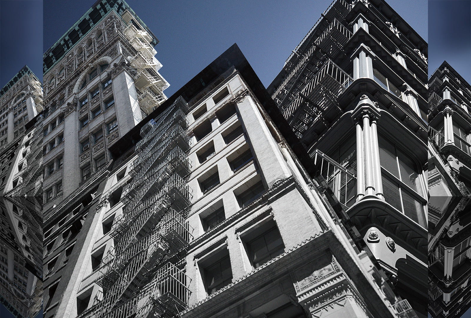 Black and white architectural photograph of a cityscape with tall buildings.