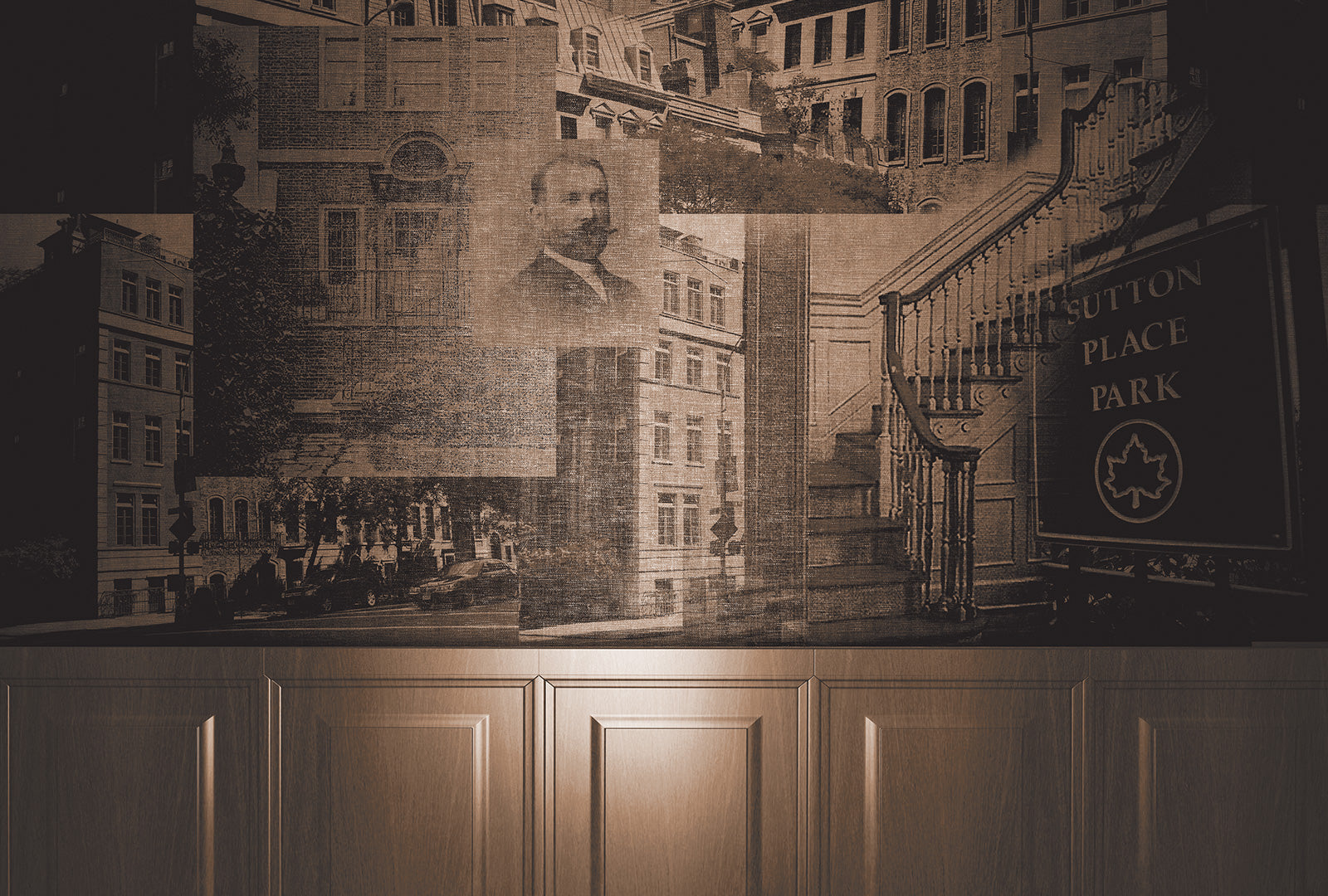 Decorative wall with architectural mural and 'Sutton Place Park' sign.